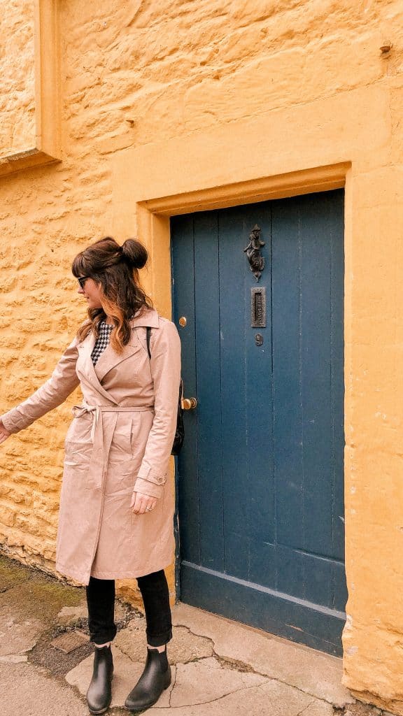 Lacock, Wiltshire, Cotswolds, UK, National Trust, England, English Countryside, girls love travel, target trench coat, a new day target, travel style, messy bun, i have this thing with doors